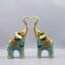 SUGUTEE Good Luck Large Elephant Statue Decorations for Home, Elephant Figurines Statues Home Decor, Elephant Gifts, Elephant Figurines with Trunk Up ( 2 Pcs Medium )